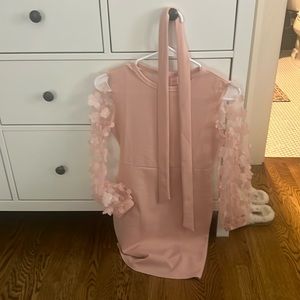 Pink long sleeve flower dress.